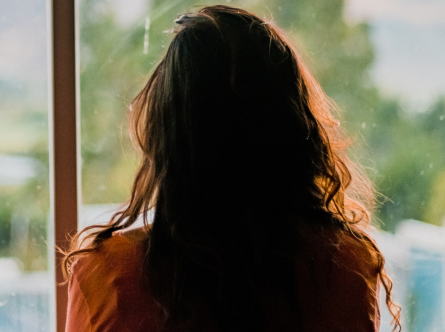 woman from behind representing trauma informed care