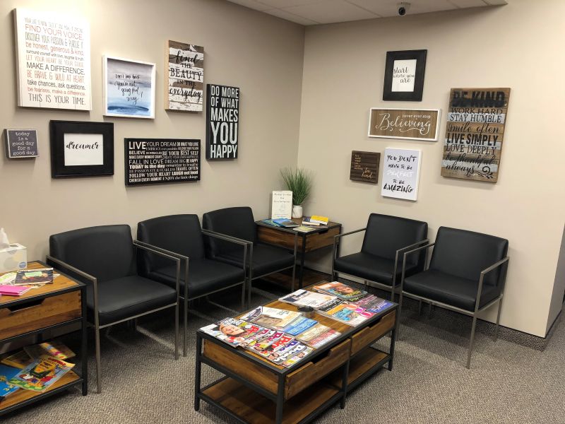 A warm and engaging welcome space serves as a siting area while clients await their therapy services.