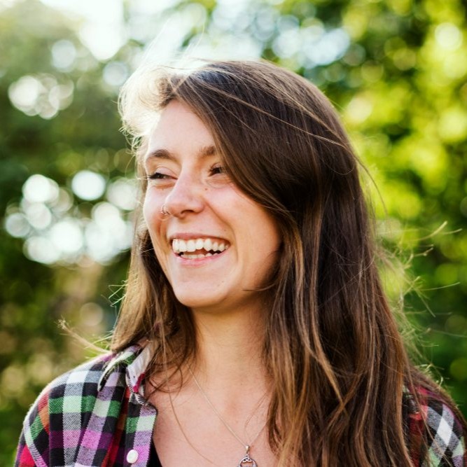 A older adolescence looks happy after receiving individual therapy